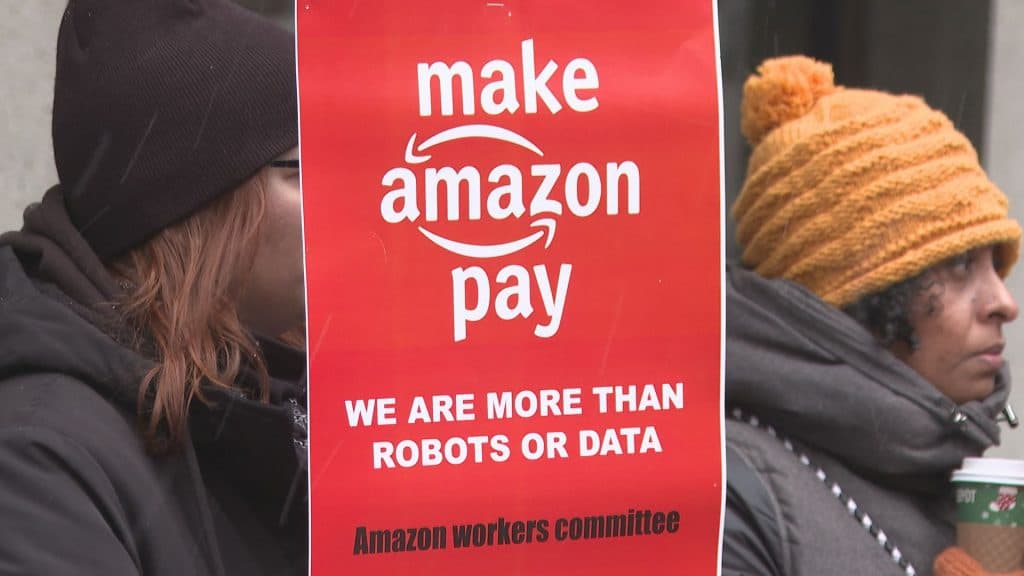 Protestors gather in downtown Montreal on Nov. 28, 2025, calling for a boycott of Amazon following the company’s earlier closure of several distribution centers that left 4,500 workers without jobs. (CityNews)