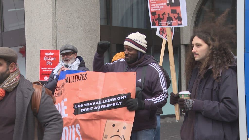 Protestors gather in downtown Montreal on Nov. 28, 2025, calling for a boycott of Amazon following the company’s earlier closure of several distribution centers that left 4,500 workers without jobs. (CityNews)